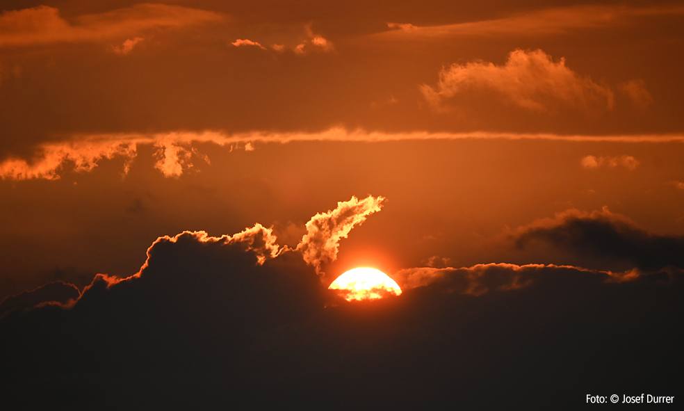 Sonne une Wolken